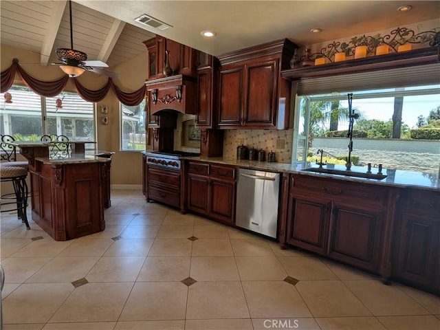 2622 Chauncy Pl, Riverside, CA 92506 - kitchen featuring appliances with stainless steel finishes, healthy amount of natural light, ceiling fan, tasteful backsplash, and recessed lighting
