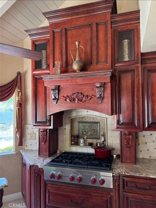 2622 Chauncy Pl, Riverside, CA 92506 - kitchen with stainless steel gas stovetop, backsplash, and reddish brown cabinets
