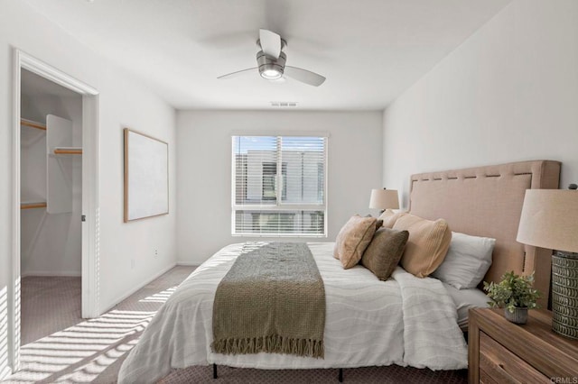 2333 Verano Way, Vista, CA 92081 - bedroom with carpet flooring, a walk in closet, ceiling fan, and a closet
