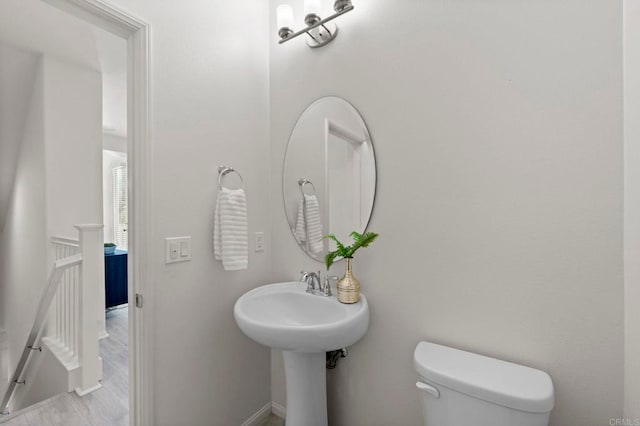 2333 Verano Way, Vista, CA 92081 - half bathroom featuring toilet and wood finished floors