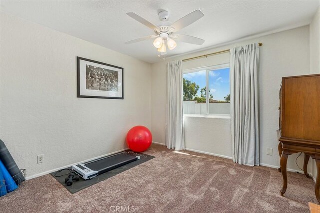 9292 Garden St, Rancho Cucamonga, CA 91701 - exercise room with carpet flooring, a ceiling fan, and a textured wall