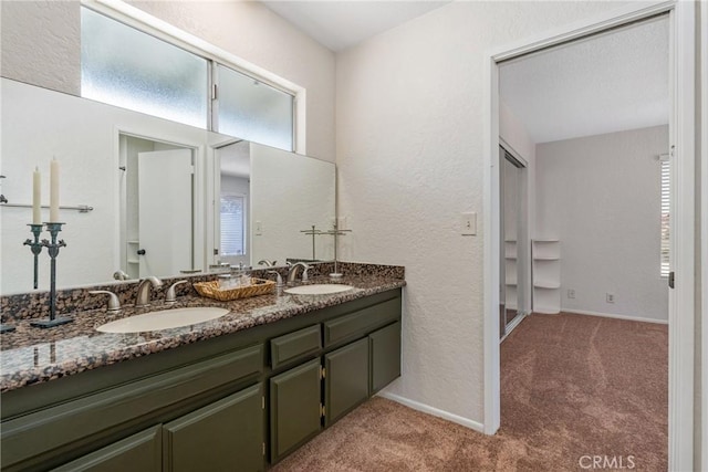 9292 Garden St, Rancho Cucamonga, CA 91701 - full bath with double vanity and a textured wall