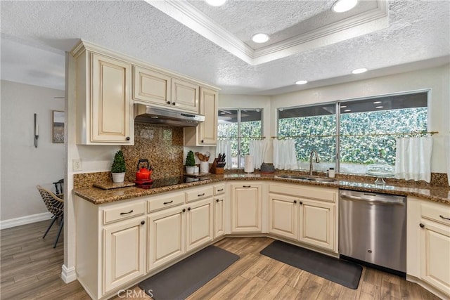 9292 Garden St, Rancho Cucamonga, CA 91701 - kitchen featuring stainless steel dishwasher, cream cabinets, under cabinet range hood, black electric cooktop, and a textured ceiling