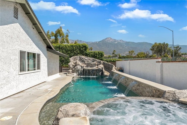 9292 Garden St, Rancho Cucamonga, CA 91701 - view of pool with a mountain view, a fenced backyard, and an in-ground hot tub
