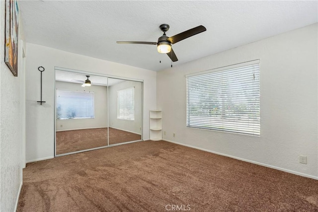 9292 Garden St, Rancho Cucamonga, CA 91701 - unfurnished bedroom with carpet, a closet, a textured wall, ceiling fan, and a textured ceiling