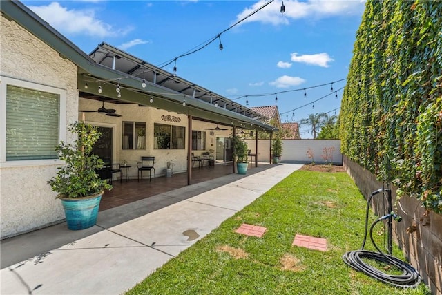 9292 Garden St, Rancho Cucamonga, CA 91701 - fenced backyard with ceiling fan and a patio