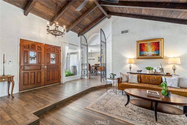 9292 Garden St, Rancho Cucamonga, CA 91701 - foyer entrance with a wood ceiling with exposed beams, a chandelier, high vaulted ceiling, and hardwood / wood-style flooring