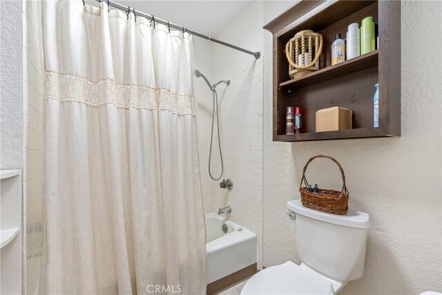 9292 Garden St, Rancho Cucamonga, CA 91701 - bathroom with a textured wall and shower / bath combination with curtain