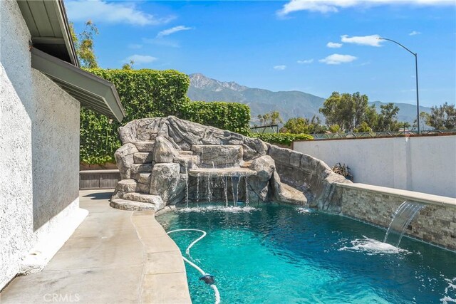 9292 Garden St, Rancho Cucamonga, CA 91701 - view of swimming pool featuring a mountain view