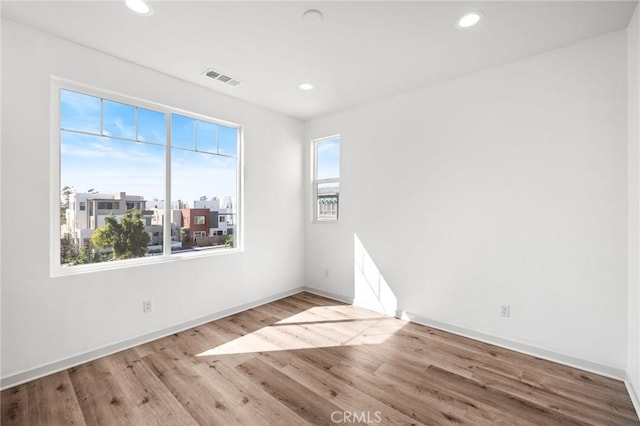 284 Novel, Irvine, CA 92618 - empty room featuring wood finished floors and recessed lighting