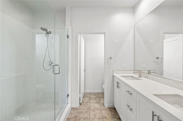 284 Novel, Irvine, CA 92618 - bathroom featuring a shower stall, double vanity, and tile patterned floors