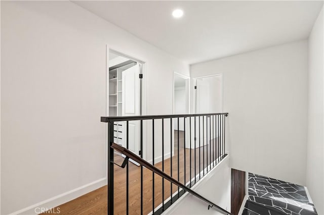 22526 Napa St, West Hills, CA 91304 - corridor with an upstairs landing, wood finished floors, and recessed lighting