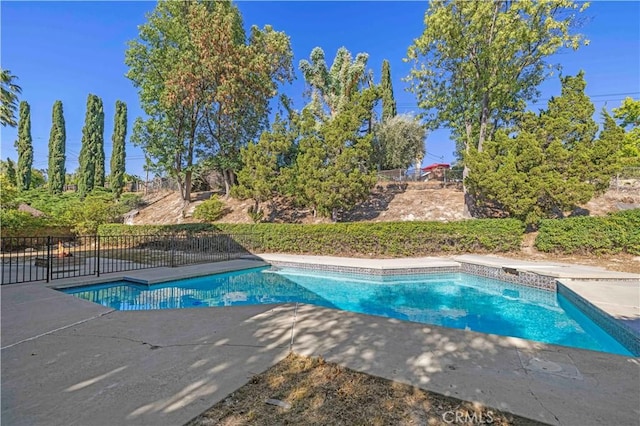 22526 Napa St, West Hills, CA 91304 - view of swimming pool with a patio area