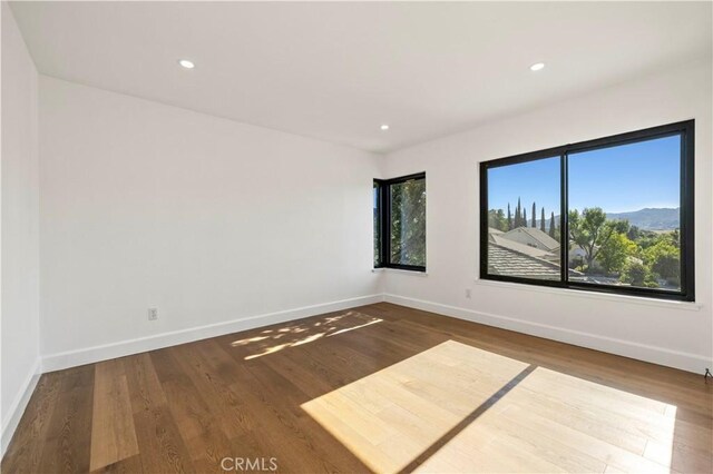 22526 Napa St, West Hills, CA 91304 - unfurnished room with wood finished floors and recessed lighting
