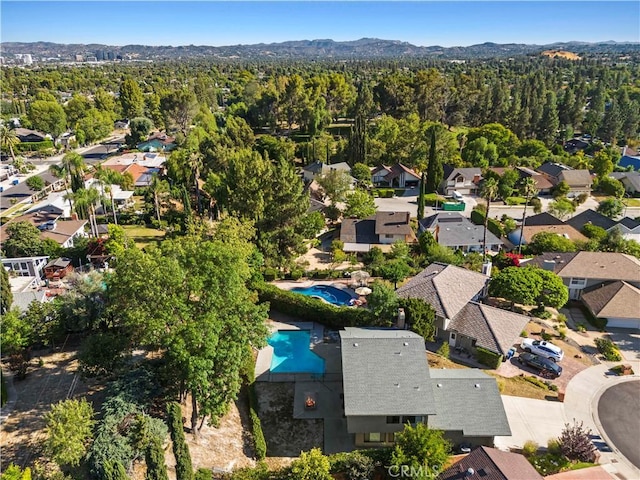 22526 Napa St, West Hills, CA 91304 - aerial view of residential area with a pool and a heavily wooded area