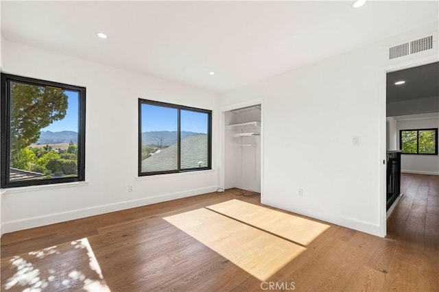 22526 Napa St, West Hills, CA 91304 - unfurnished bedroom featuring wood finished floors, recessed lighting, and a closet
