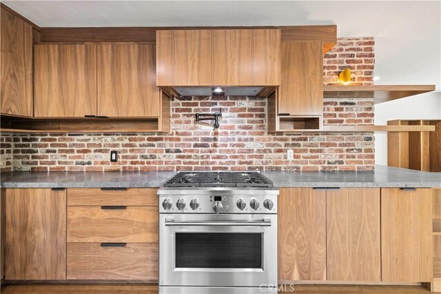 22526 Napa St, West Hills, CA 91304 - kitchen featuring high end stainless steel range, modern cabinets, backsplash, wood finished floors, and brown cabinets