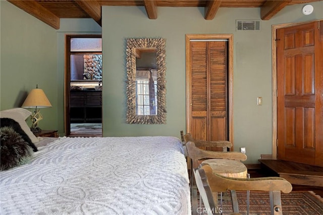 969 Oak Dr, Crestline, CA 92325 - bedroom featuring beamed ceiling and baseboards