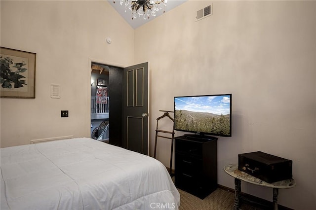 969 Oak Dr, Crestline, CA 92325 - bedroom featuring a chandelier, carpet, and high vaulted ceiling