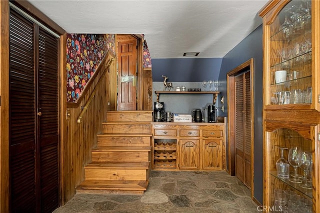 969 Oak Dr, Crestline, CA 92325 - bar area with stone finish flooring and stairs