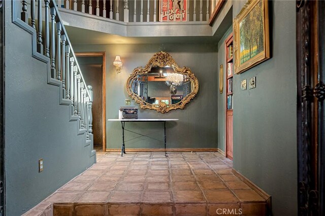 969 Oak Dr, Crestline, CA 92325 - entryway featuring stairs and a high ceiling