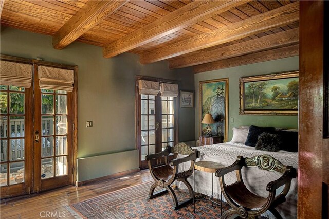 969 Oak Dr, Crestline, CA 92325 - bedroom with french doors, a wood ceiling with exposed beams, and hardwood / wood-style flooring