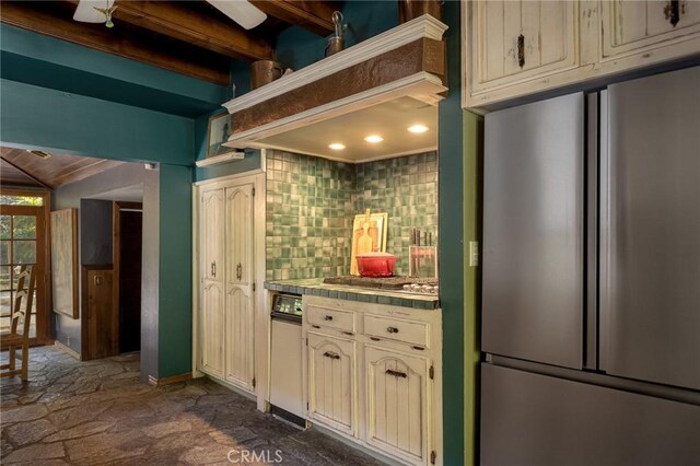969 Oak Dr, Crestline, CA 92325 - kitchen with stainless steel refrigerator, tile countertops, decorative backsplash, and dark stone finish flooring