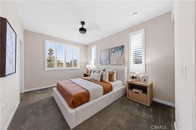 107 Bowery, Irvine, CA 92612 - bedroom with dark carpet and baseboards