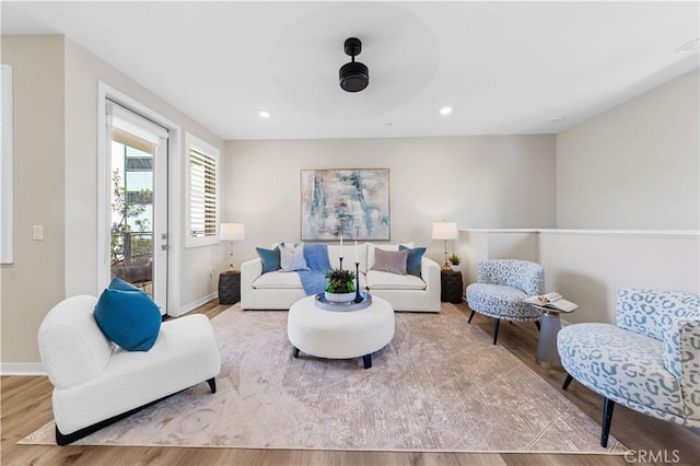 107 Bowery, Irvine, CA 92612 - living area featuring wood finished floors, ceiling fan, and recessed lighting