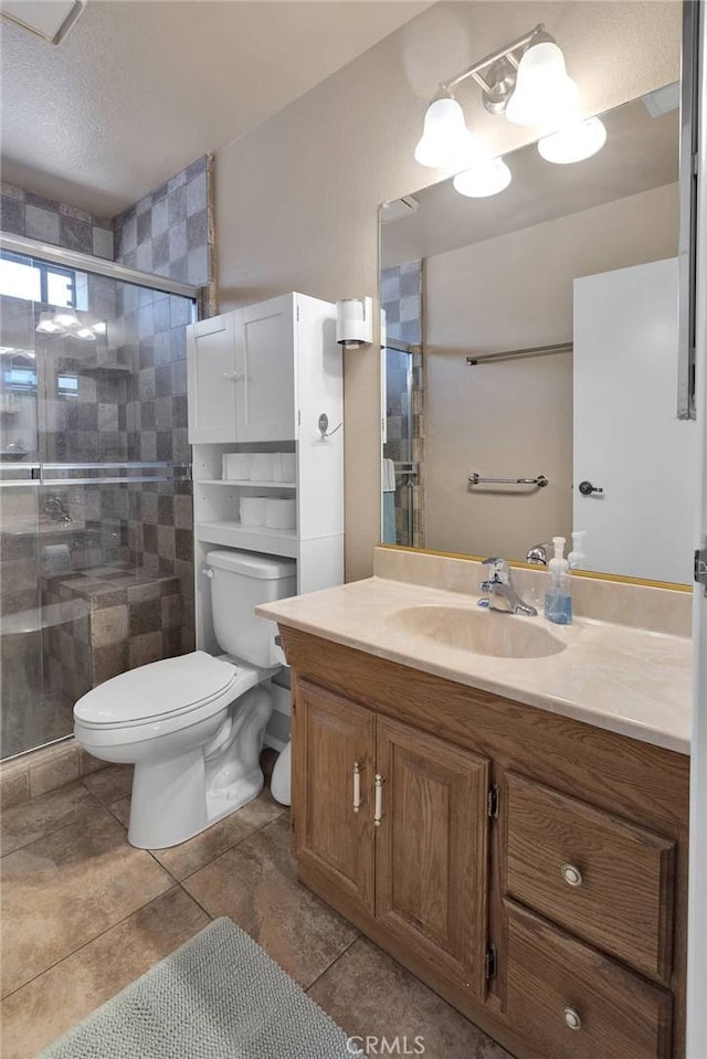 7505 Jenkins Ave, Hesperia, CA 92345 - full bathroom featuring vanity, a stall shower, and tile patterned floors