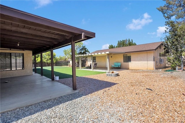 7505 Jenkins Ave, Hesperia, CA 92345 - fenced backyard with a patio area