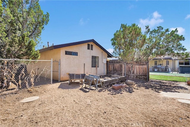 7505 Jenkins Ave, Hesperia, CA 92345 - rear view of house with stucco siding