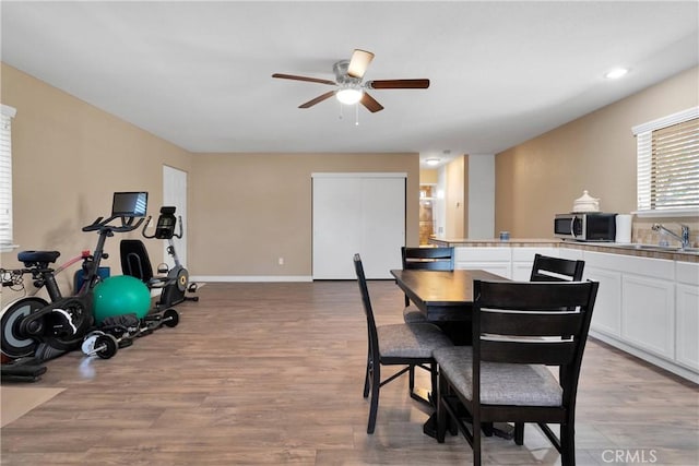 7505 Jenkins Ave, Hesperia, CA 92345 - dining space with a ceiling fan and wood finished floors