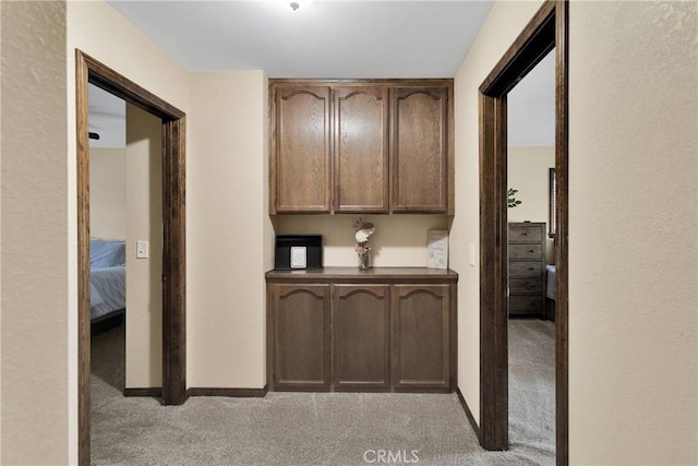 7505 Jenkins Ave, Hesperia, CA 92345 - hallway with carpet floors and baseboards