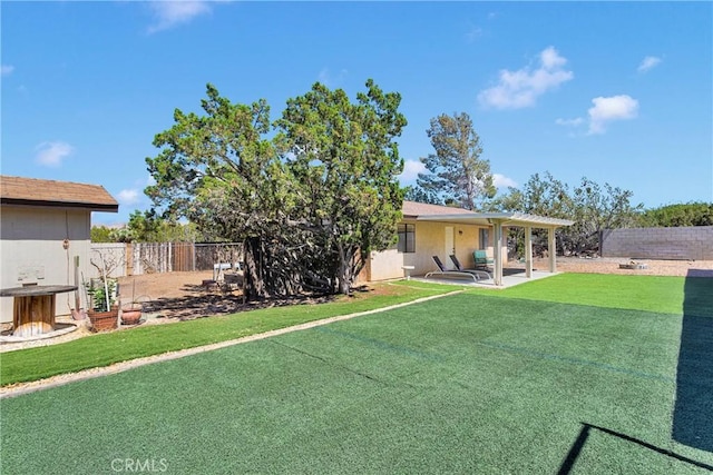 7505 Jenkins Ave, Hesperia, CA 92345 - rear view of property featuring a fenced backyard and a patio area