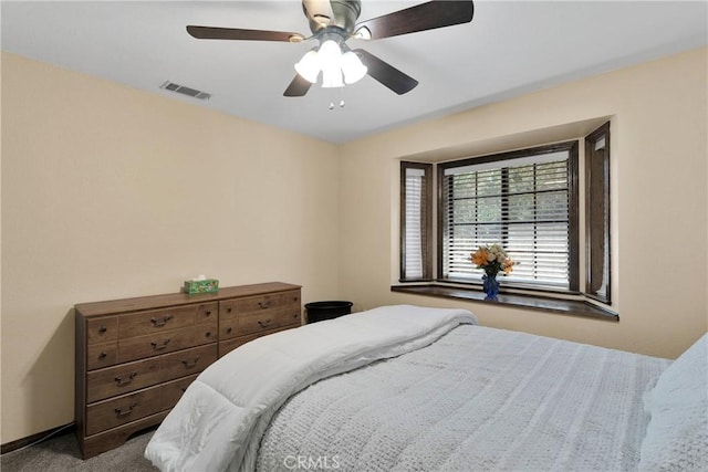 7505 Jenkins Ave, Hesperia, CA 92345 - bedroom with dark colored carpet and a ceiling fan