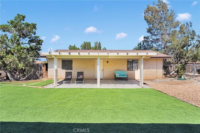 7505 Jenkins Ave, Hesperia, CA 92345 - rear view of house with stucco siding and a patio