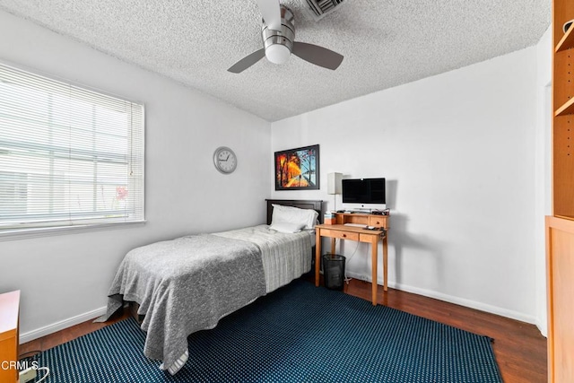 331 N Avon St, Burbank, CA 91505 - bedroom with wood finished floors, a textured ceiling, and a ceiling fan