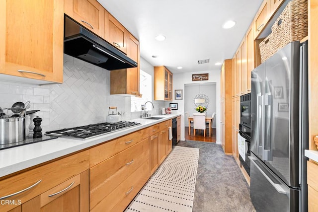 331 N Avon St, Burbank, CA 91505 - kitchen with stainless steel appliances, exhaust hood, backsplash, light countertops, and recessed lighting