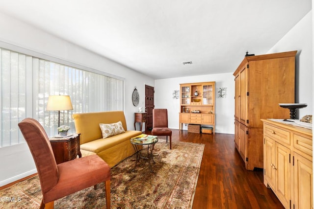 331 N Avon St, Burbank, CA 91505 - living room featuring dark wood-style flooring and baseboards