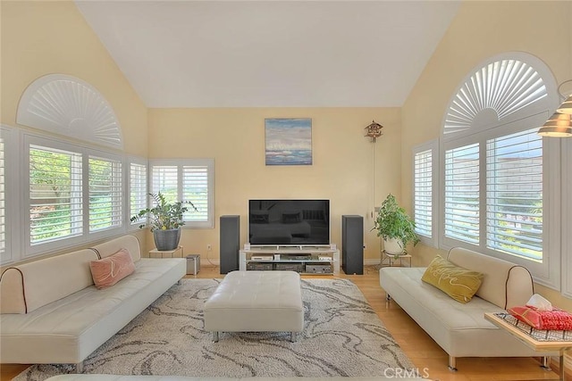 3039 Olympic View Dr, Chino Hills, CA 91709 - living room with vaulted ceiling and light wood-style floors