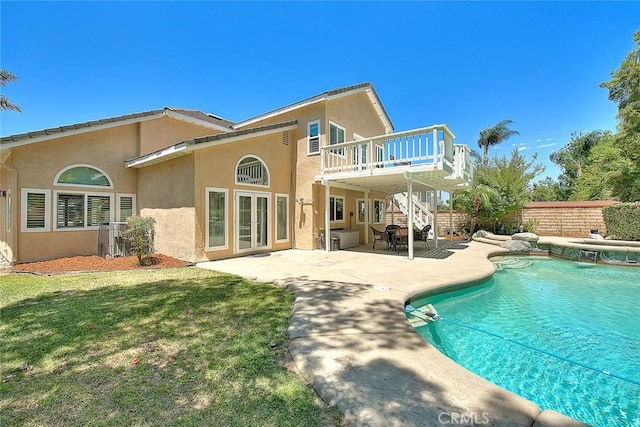 3039 Olympic View Dr, Chino Hills, CA 91709 - rear view of property featuring a wooden deck, stairway, stucco siding, a patio area, and french doors