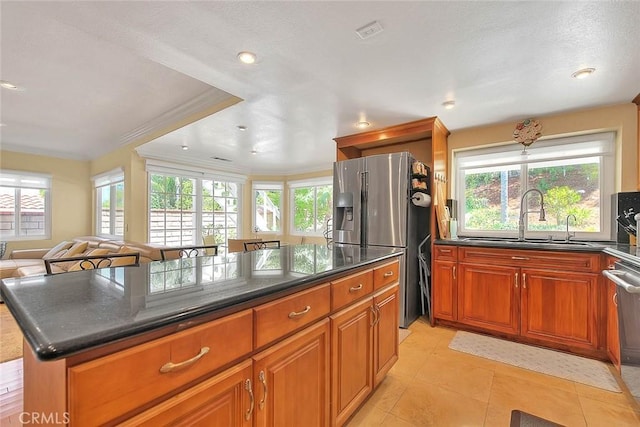 3039 Olympic View Dr, Chino Hills, CA 91709 - kitchen with stainless steel appliances, plenty of natural light, a center island, open floor plan, and recessed lighting