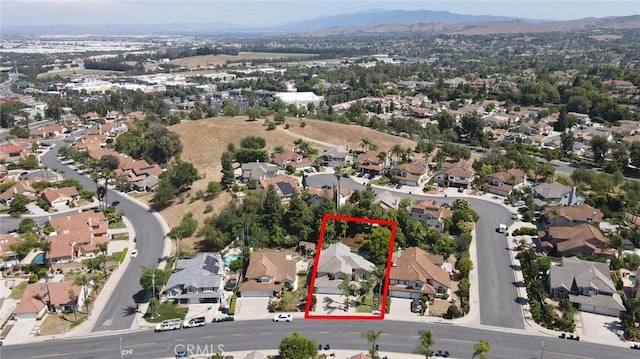 3039 Olympic View Dr, Chino Hills, CA 91709 - aerial view of property and surrounding area with nearby suburban area and property boundaries highlighted