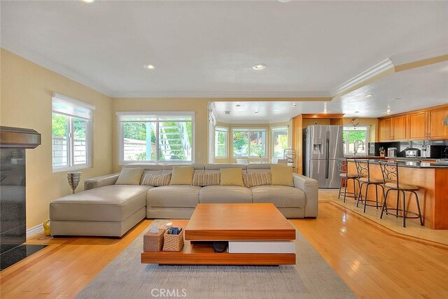 3039 Olympic View Dr, Chino Hills, CA 91709 - living room with crown molding, light wood-type flooring, healthy amount of natural light, and recessed lighting