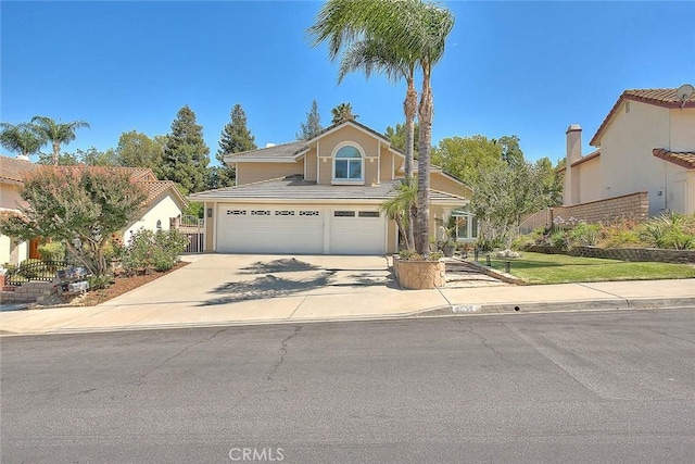 3039 Olympic View Dr, Chino Hills, CA 91709 - traditional-style house featuring driveway, a tiled roof, and an attached garage