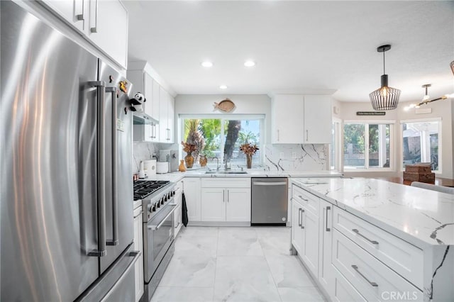 2741 Olympic View Dr, Chino Hills, CA 91709 - kitchen featuring high end appliances, healthy amount of natural light, decorative backsplash, and recessed lighting