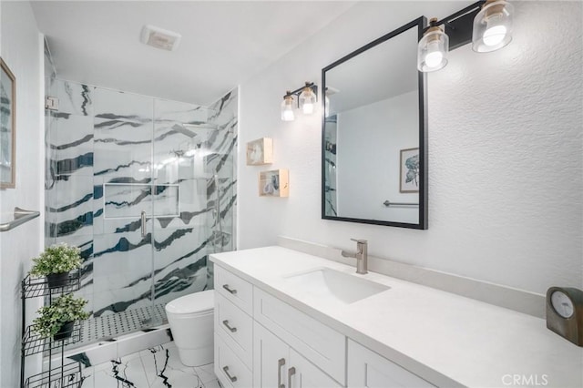 2741 Olympic View Dr, Chino Hills, CA 91709 - bathroom with marble look tiles, vanity, a marble finish shower, and a textured wall