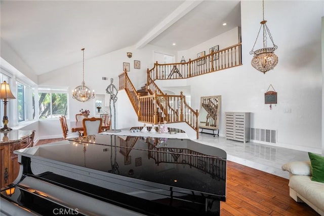 2741 Olympic View Dr, Chino Hills, CA 91709 - living room featuring a chandelier, stairs, wood finished floors, high vaulted ceiling, and beamed ceiling
