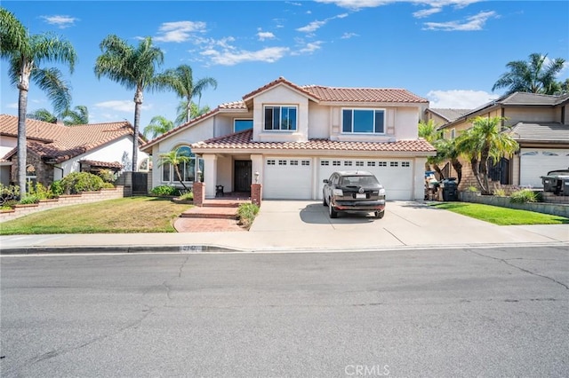 2741 Olympic View Dr, Chino Hills, CA 91709 - mediterranean / spanish home with a garage, stucco siding, concrete driveway, a tiled roof, and a front yard